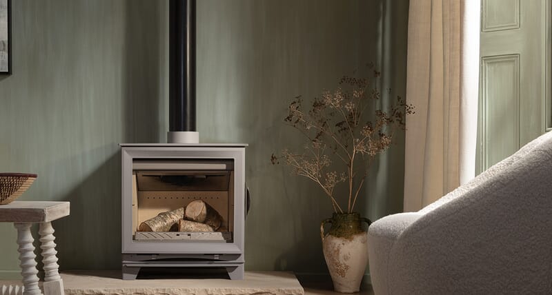 Arada M Series 5 Widescreen stove with cast iron door and optional feet all in Pebble colourway